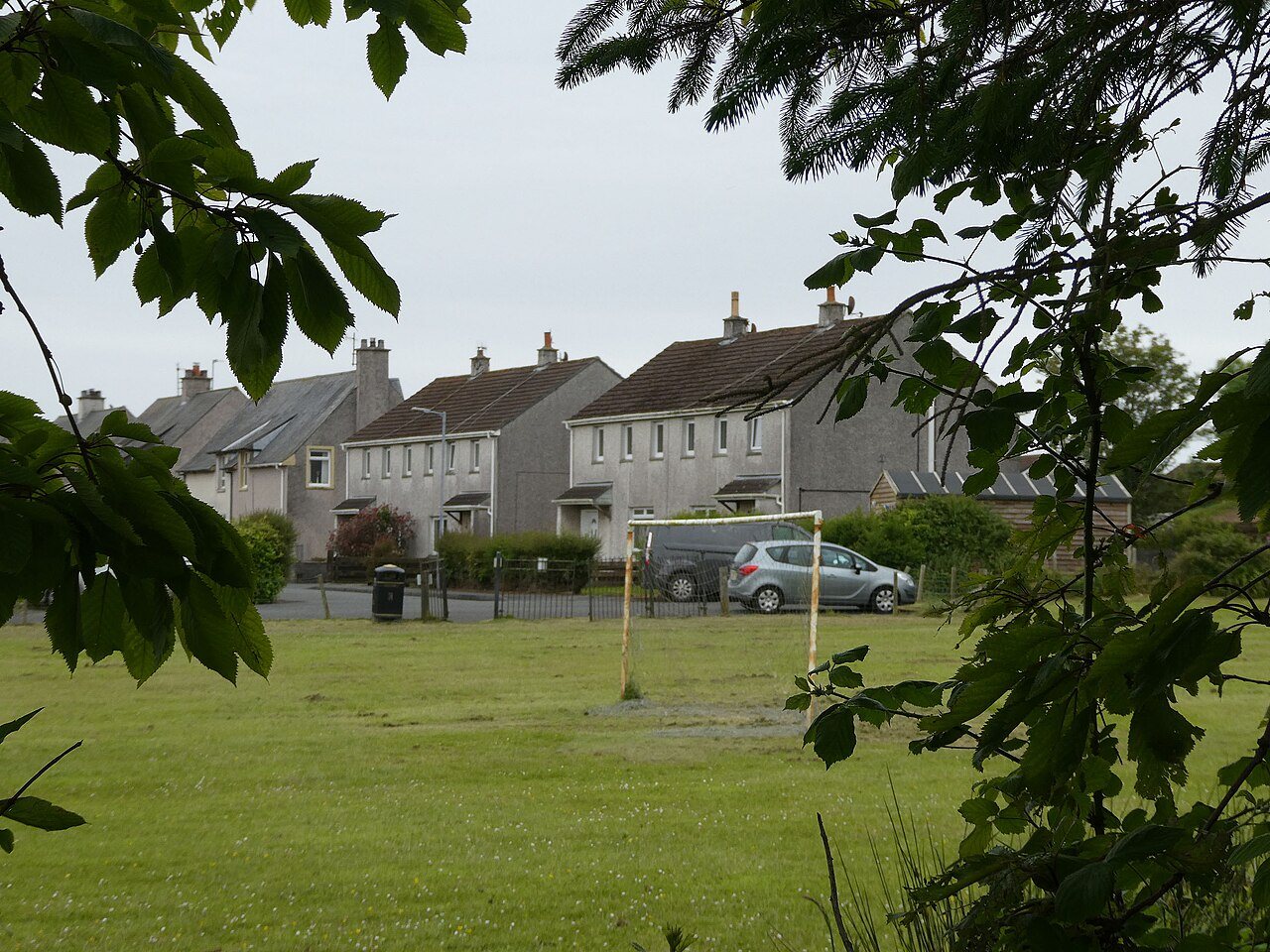 Homes around a green in Leswalt village.
